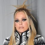 Avril Lavigne looks unrecognisable in jaw-dropping dress and punky hair