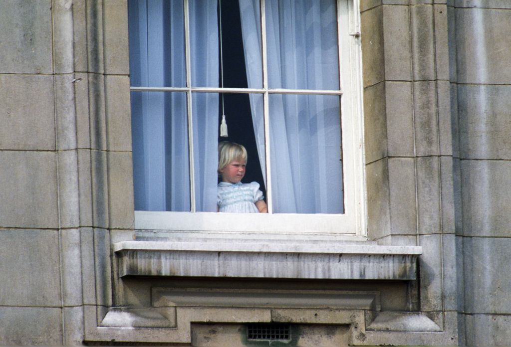 Zara Phillips looks out the window at Buckingham Palace