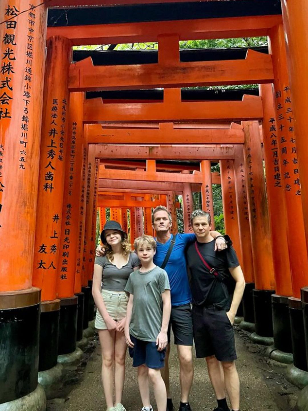 Neil Patrick Harris, David Burtka and their twins under the Japanese arch