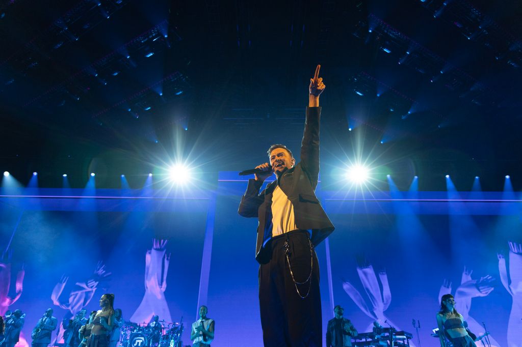 Justin Timberlake performing onstage during his concert "the forgotten yesterday" world Tour 