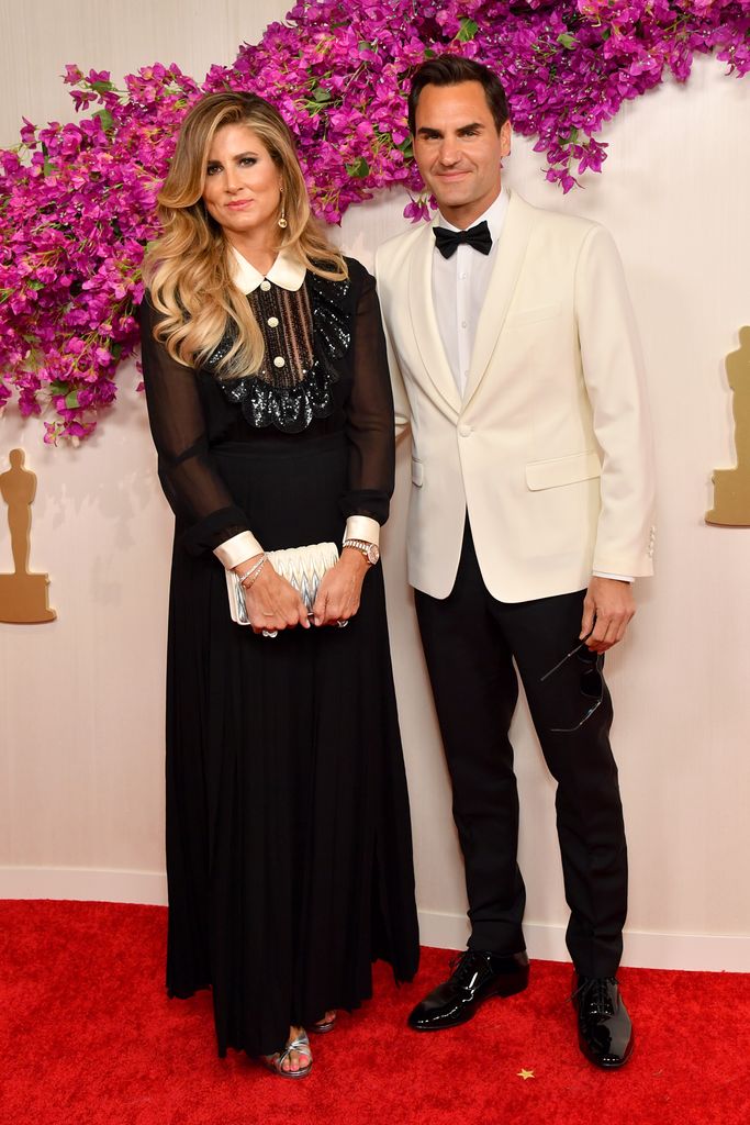 Mirka Federer and Roger Federer attend the 96th Annual Academy Awards on March 10, 2024 in Hollywood, California