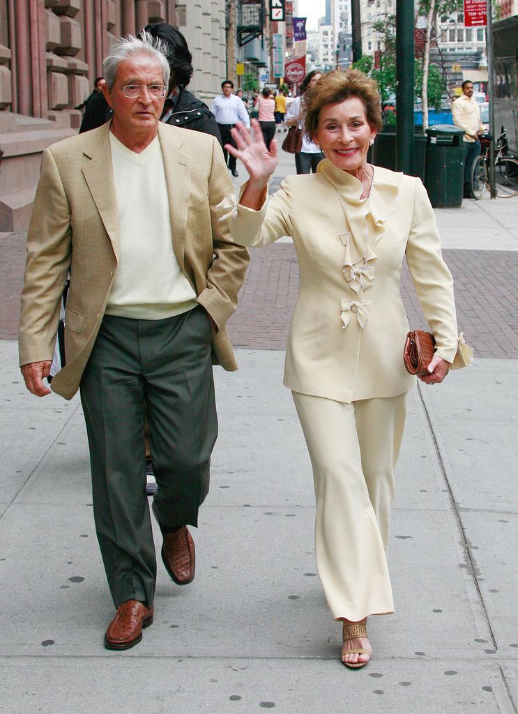 Judge Judy taking a walk with her husband 
