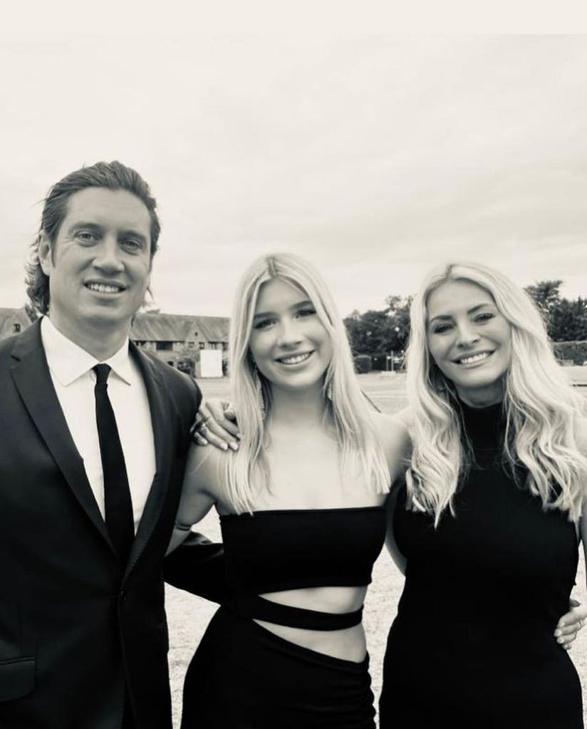 Tess Daly and Vernon Kay in black and white portrait with daughter