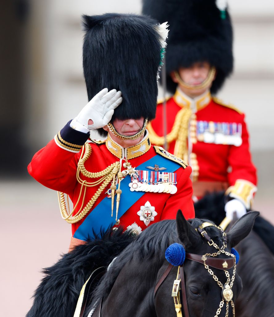 King Charles on horseback in military uniform