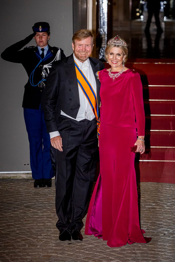 King Willem-Alexander and Queen Maxima of the Netherlands outside the palace