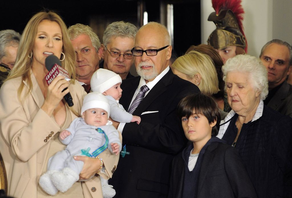 Singer Celine Dion holds her son Nelson Angelil and husband and manager Rene Angelil, holding her son Eddie Angelil next to Rene-Charles Angelil and Dion's mother Theresa Dion, holding her son, as they arrive at Caesars Palace in Las Vegas, Nevada on February 16, 2011. (Photo by Steven Lawton/FilmMagic)