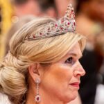 Queen Máxima dazzles in majestic tiara and satin thigh-split gown