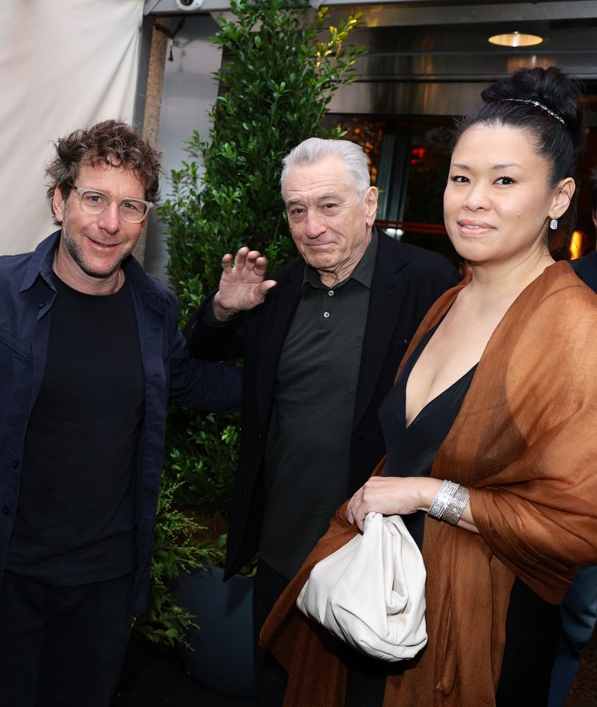 NEW YORK, NEW YORK – JUNE 10: (L-R) Dustin Yellin, Robert De Niro and Tiffany Chen attend the Chanel Tribeca Festival Artist Dinner at Odeon in New York City on June 10, 2024. (Photo: Dimitrios Kambouris/WireImage)