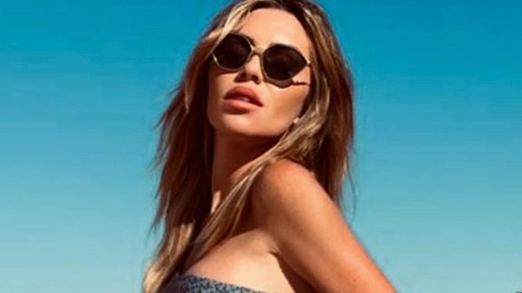 Abbey Clancy has legs for days in tiny string bikini on romantic holiday