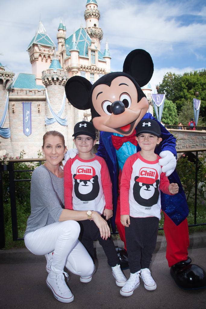 ANAHEIM, CALIFORNIA - OCTOBER 14: In this handout image provided by Disneyland Resort, Celine Dion and twin sons Eddie (left) and Nelson, age 4, celebrate the boys' upcoming fifth birthday with Mickey Mouse at Disneyland Park in Anaheim, California on Wednesday. The Disneyland Resort Diamond Celebration will celebrate 60 years of magic through September 5, 2016. (Photo by Scott Brinegar/Disneyland Resort via Getty Images)