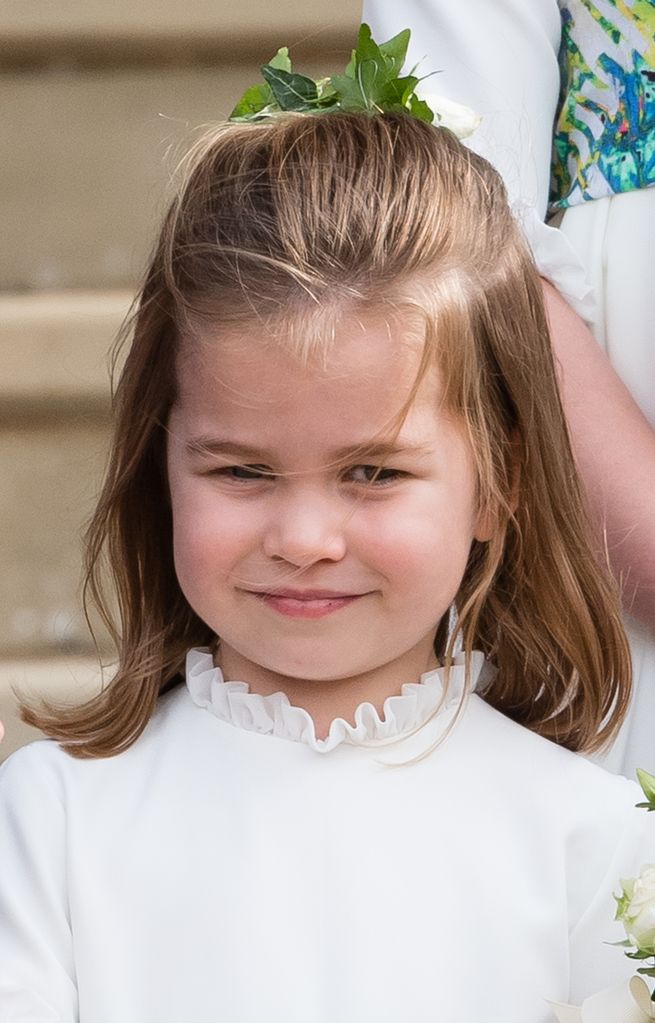     Princess Charlotte attends the wedding of Princess Eugenie of York and Jack Brooksbank at St George's Chapel on October 12, 2018 in Windsor, England