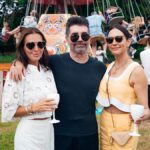 Simon Cowell and Lauren Silverman pictured on family day out with famous neighbours