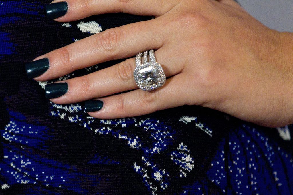 Khloe's ring featured a square cushion-cut white diamond