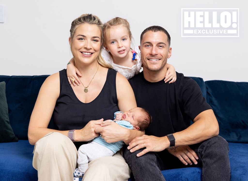 Gemma Atkinson and Gorka Marquez sitting on the couch with the kids