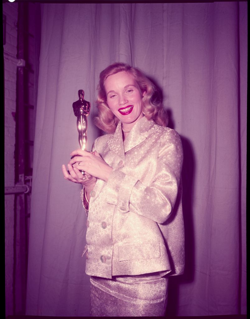 With Eva Marie Saint "Oscars" For his role in 'On the Waterfront'.