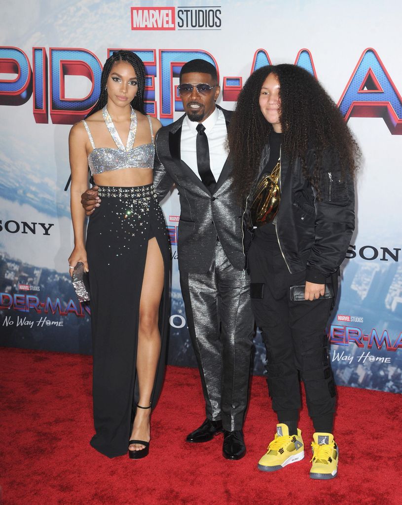 LOS ANGELES, CALIFORNIA – DECEMBER 13: Corinne Foxx, Jamie Foxx and Annalise Foxx attend the Sony Pictures Show. "Spider-Man: No Way Home" The Los Angeles premiere was held at The Regency Village Theatre in Los Angeles, California on December 13, 2021. (Photo: Albert L. Ortega/Getty Images)