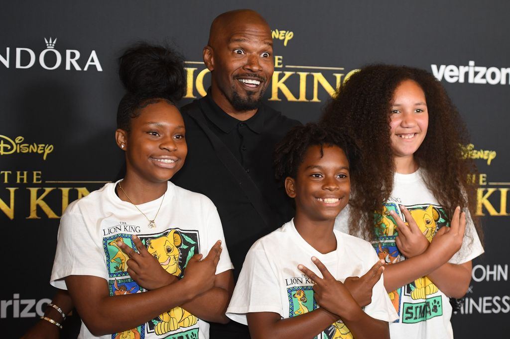 Topshot - American actor Jamie Foxx (centre), daughter Annelise (right) and friends arrive for the world premiere of Disney's film "The Lion King" At the Dolby Theatre in Hollywood on July 9, 2019. (Photo: ROBIN BECK/AFP) (Photo: ROBIN BECK/AFP via Getty Images)