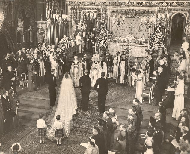 Prince Michael was a page boy at the Queen's wedding to Prince Philip in 1947. Above: The Prince (left, holding up the then Princess's train) is seen at the service in Westminster Abbey