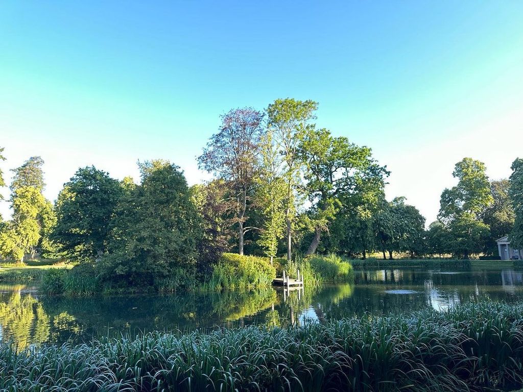 Charles Spencer's Lake at Althorp House, in the Sun