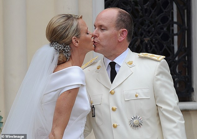 When the playboy prince and the Olympian said ‘oui’: How Prince Albert and Princess Charlene of Monaco had TWO wedding ceremonies 13 years ago – but their uneasy kiss and her tears hinted at trouble