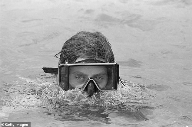 Prince Charles swimming while on holiday in Barbados in October 1970