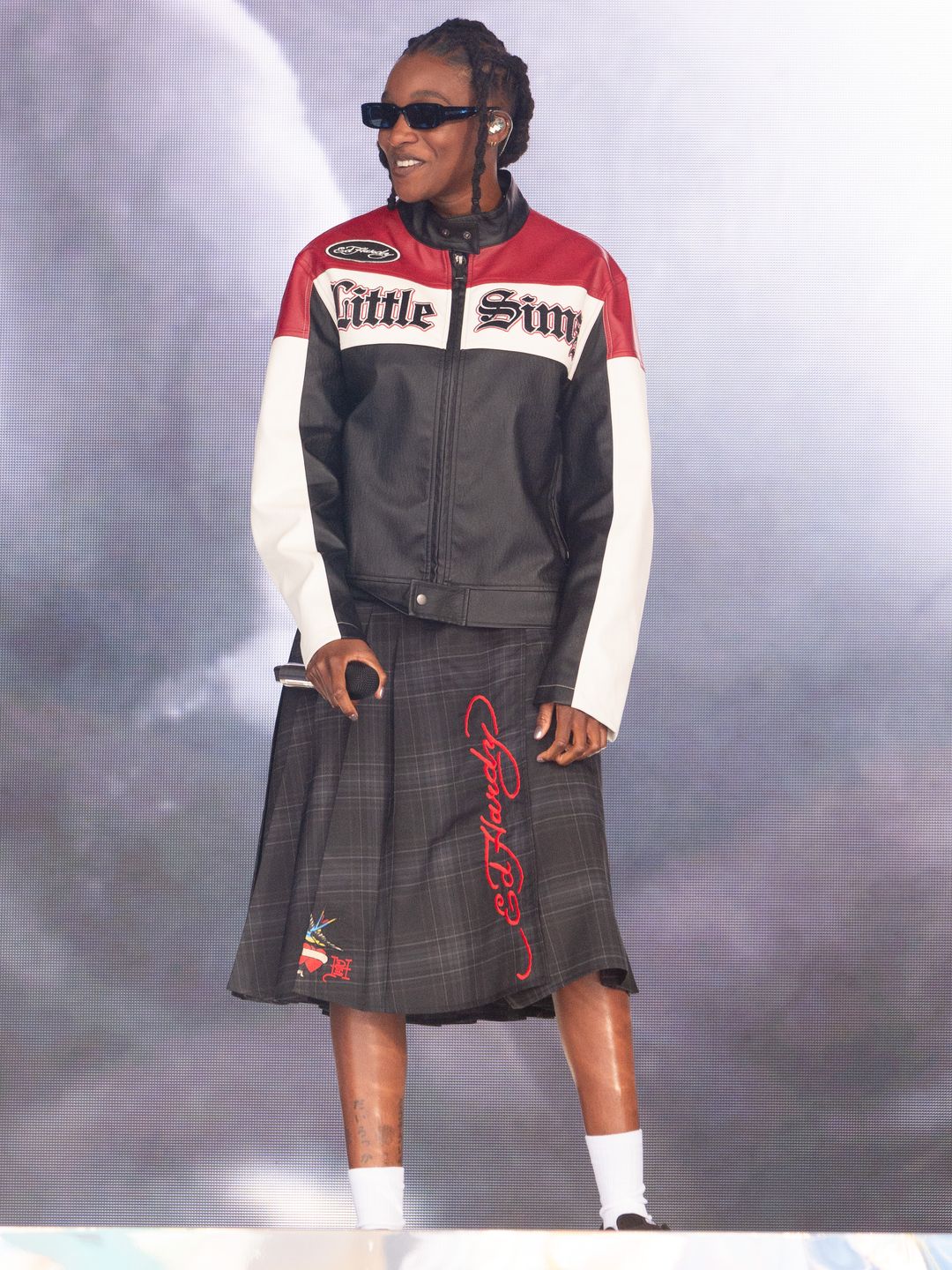 Little Simz performed wearing a customized motorbike jacket and Ed Hardy skirt