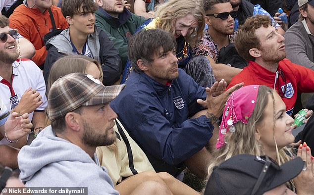 The One Direction star was branded a 'hero' by fans after setting up a TV at his campsite to watch the Three Lions thrilling victory over Slovakia
