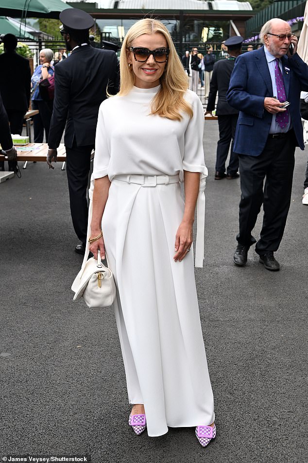 The singer, 44, arrived in stylish fashion at the All England Lawn Tennis and Croquet Club in south-west London before taking her seat in the Royal Box.