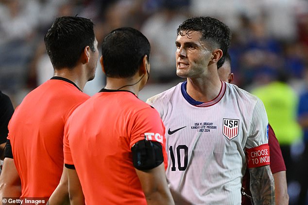 Pulisic looked angry while talking to three officials at the end of the match in Kansas City