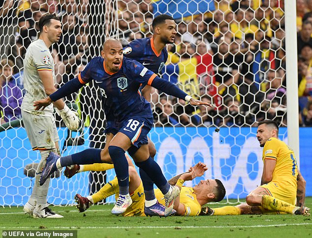 Romania 0-3 Netherlands: Ronald Koeman’s side set up quarter-final with Austria or Turkey as Donyell Malen nets late brace to add to Cody Gakpo first-half strike