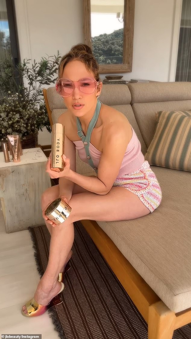 Jennifer Lopez flaunted her very slender physique on Tuesday as she promoted her JLo Beauty line - amid claims that her marriage to Ben Affleck is 'over'