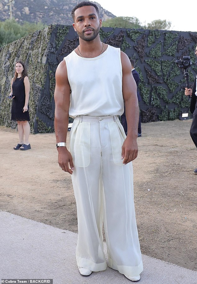 The Netflix actor flaunted his bulging biceps as he wore a cream sheer tank top. To finish off his relaxed look, Lucien paired his ensemble with some leather slip-on loafers