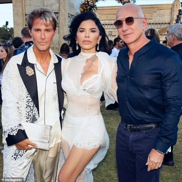 Also spotted at the fashion event was Lauren Sanchez and her billionaire fiancé Jeff Bezos, (rght) (pictured with a fellow model guest)