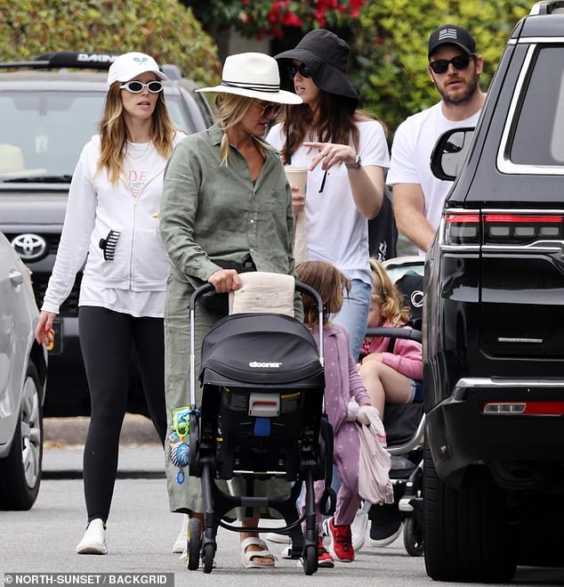 The fan-favourite actress was on stroller duty and was accompanied by Chris, 45
