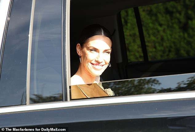 Former 90210 actress Jessica Lowndes was also spotted flashing a friendly smile from her car