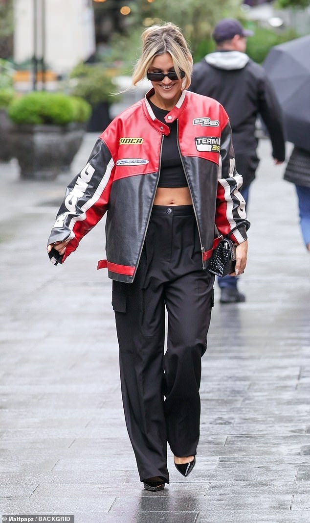 Ashley completed the look with an oversized leather biker jacket and carried her essentials in a £2,000 Balenciaga bag