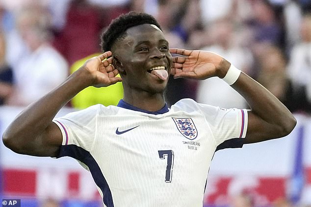 ‘Demons DEMOLISHED!’: Piers Morgan leads fans hailing Bukayo Saka’s ‘moment of redemption’ as the England star scores in penalty shootout win after miss in Euros final three years ago