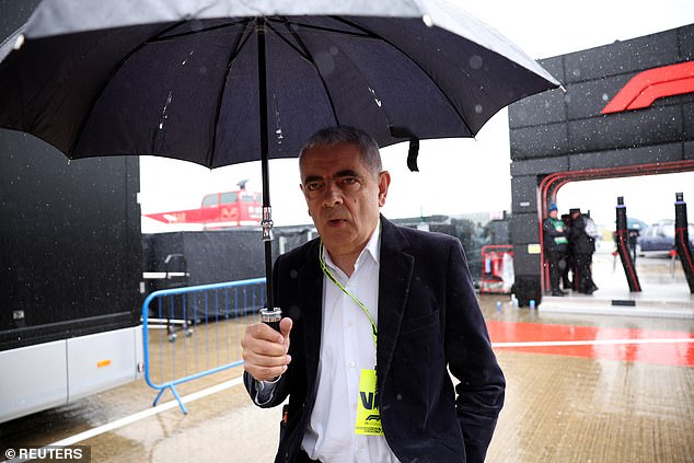 Rowan Atkinson braved the rain at the event