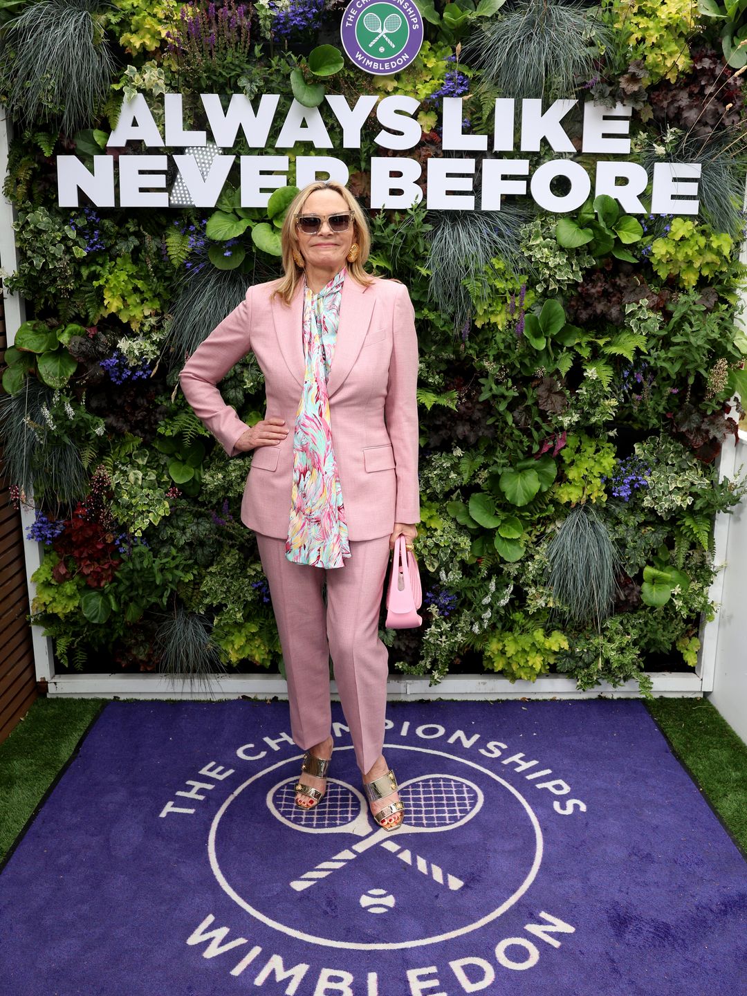 Kim Cattrall in a pink suit at Wimbledon