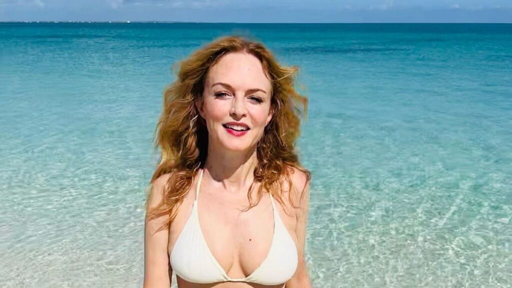 Heather Graham displays phenomenal physique in tiny string bikini in jaw-dropping new photos