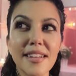 Kourtney Kardashian commands attention in mini skirt and fur jacket as she supports Travis Barker on tour