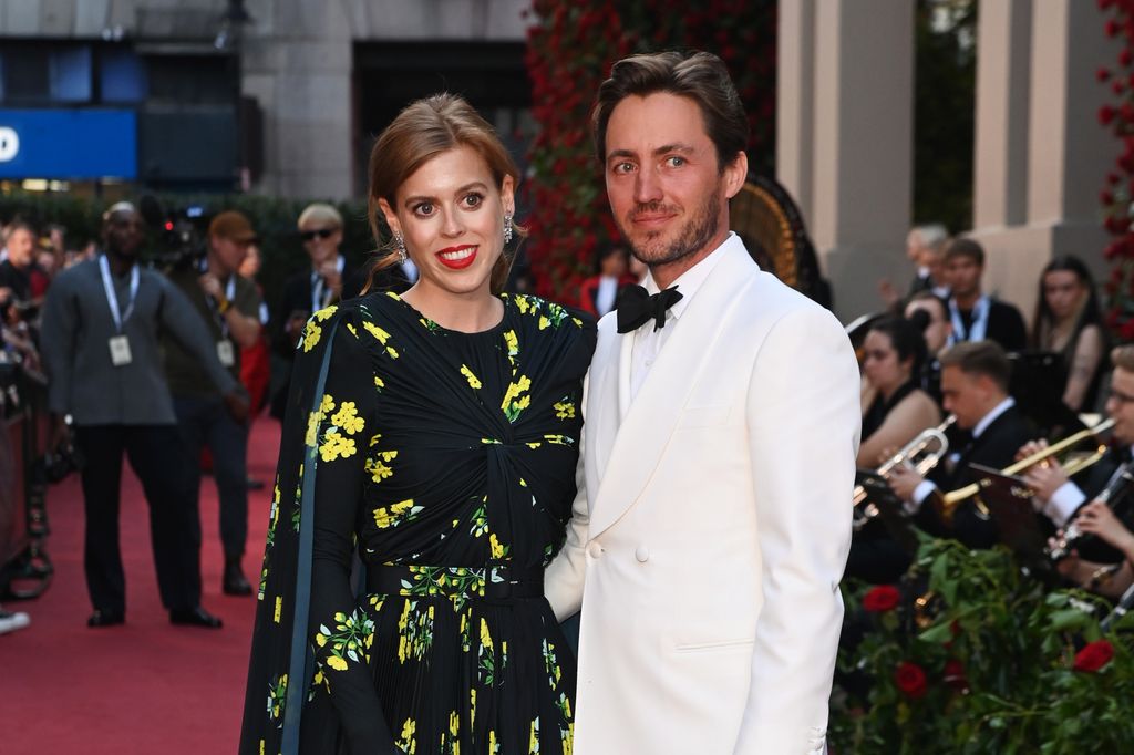 Princess Beatrice of York and her husband Edoardo Mapelli Mozzi attend Vogue World: London 2023. The princess is wearing a floral dress 