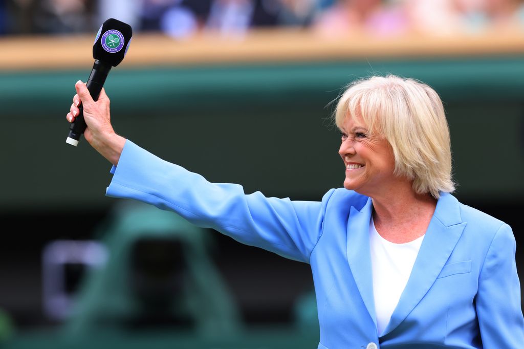 Sue Barker is introduced to the crowd at Centre Court for the 100-year celebration; 3 July 2022