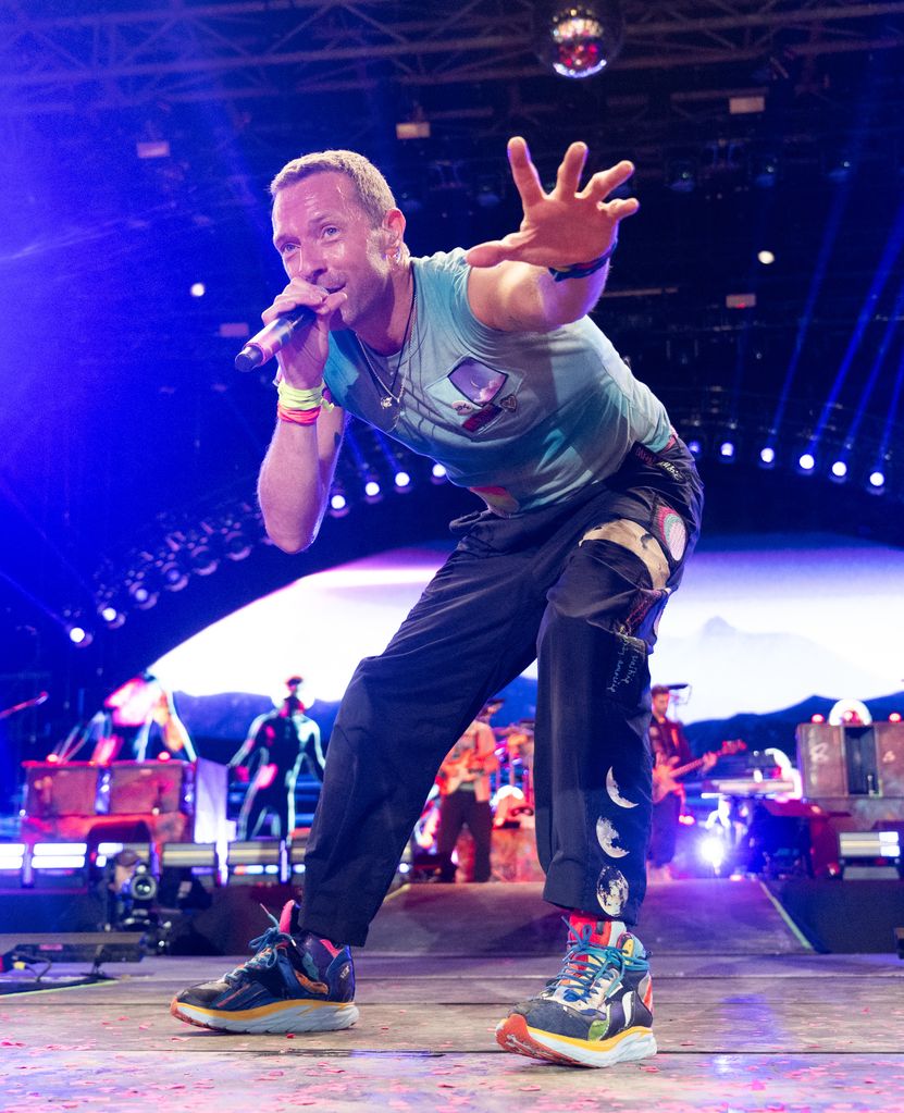 Coldplay's Chris Martin performs as the band plays on the Pyramid Stage on day four of Glastonbury Festival 2024