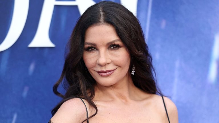 Catherine Zeta-Jones has been welcomed home by her dog after months away from shooting 'Wednesday'