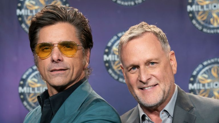 John Stamos' controversial bald cap moment has been defended by his close friend Dave Coulier