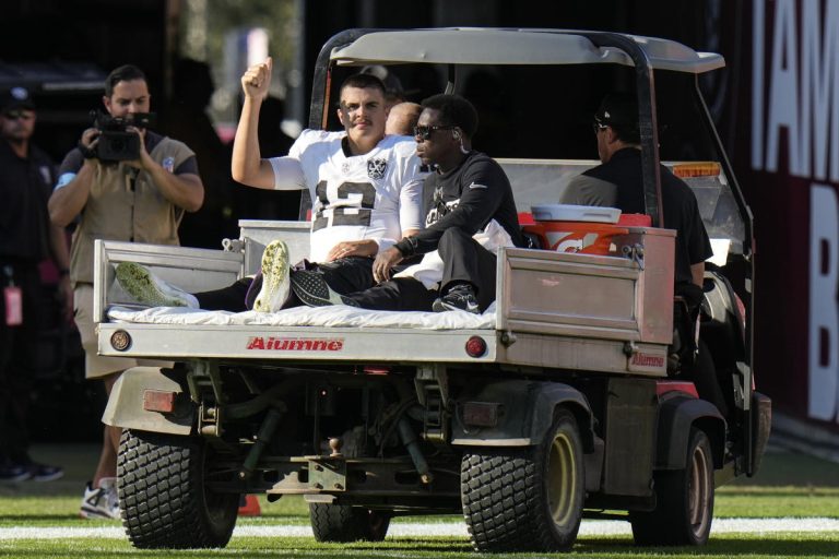 Raiders QB Aidan O'Connell was injured after Kalijah Kancy was bumped into the back